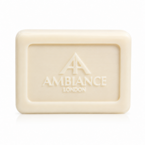 Cream-coloured rectangular jasmine soap with "Ancienne Ambiance London" embossed logo in the centre. The texture appears smooth and clean.