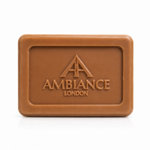 A brown rectangular bar of Amber soap embossed with the "Ambiance Ambiance London" and a stylised "AA" logo in the centre, on a white background.