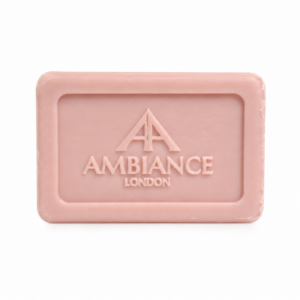 A rectangular pink fig soap bar embossed with "Ancienne Ambiance London" logo. The smooth texture and soft colour convey a sense of luxury and elegance.