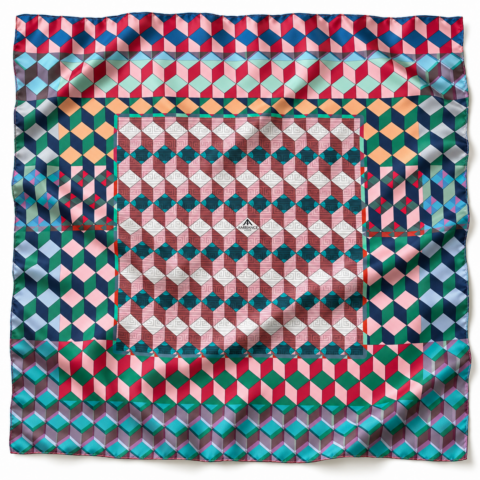 A vibrant, geometric pattern scarf with interlocking cubes in red, blue, green, and pink. It creates a bold, dynamic, and energetic visual effect.