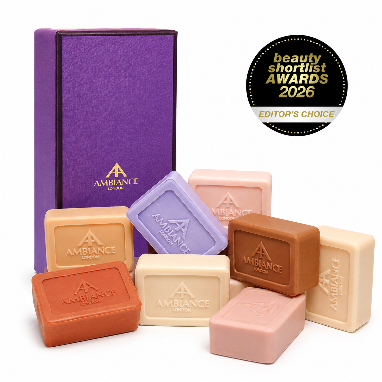 A collection of colourful Ancienne Ambiance London soaps displayed in front of a purple gift box. A "Beauty Shortlist Awards 2026 Editor's Choice" badge is visible.