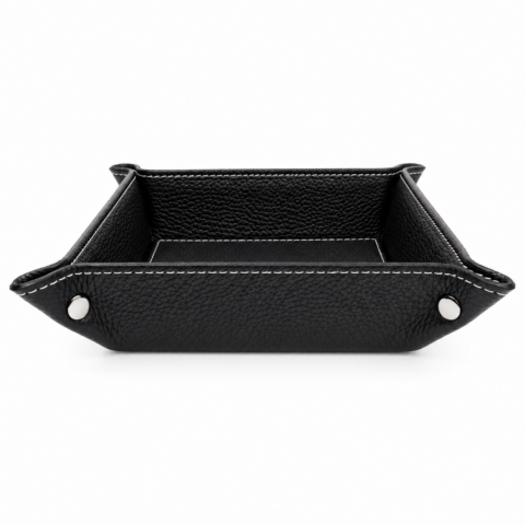 A square black leather tray with white stitching and silver button accents at the corners. The textured leather gives a sleek and elegant appearance.