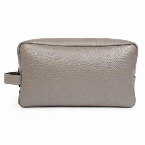 A grey leather toiletry bag with a textured surface, rectangular shape and a side handle is shown against a plain white background.