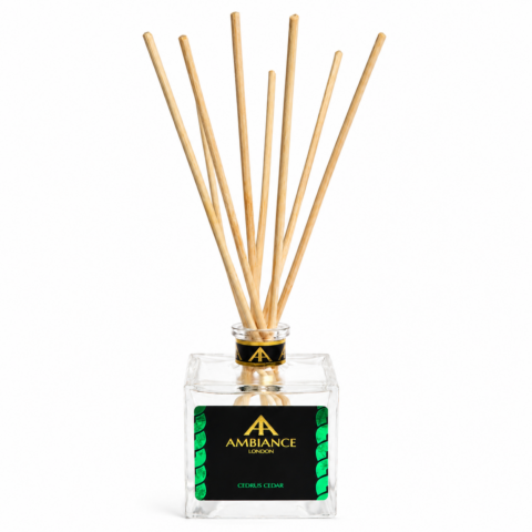 Square glass diffuser bottle labeled "Ambiance London Citrus Cedar," filled with natural reed sticks. The label is black and green, creating a fresh, elegant feel.