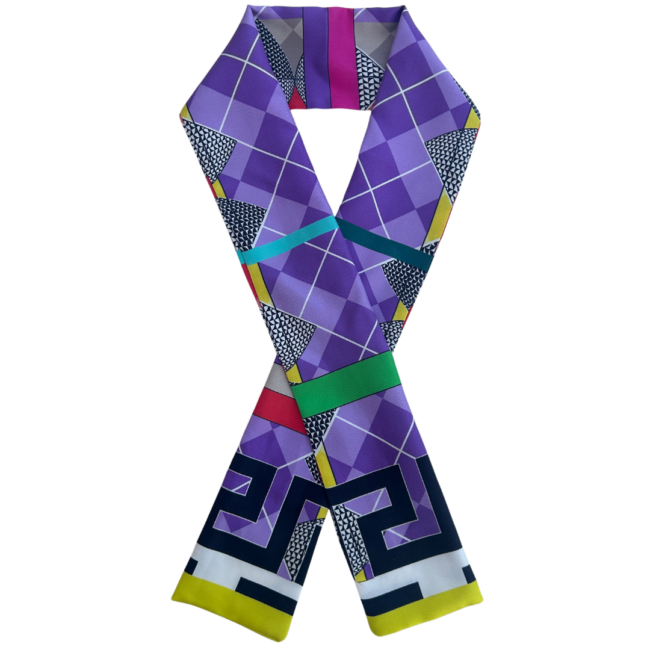 A multicoloured silk twilly scarf.