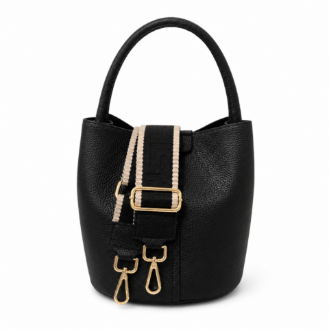 Black leather bucket bag with a wide, detachable strap featuring black and beige stripes. Gold clasps and buckles add a touch of elegance.