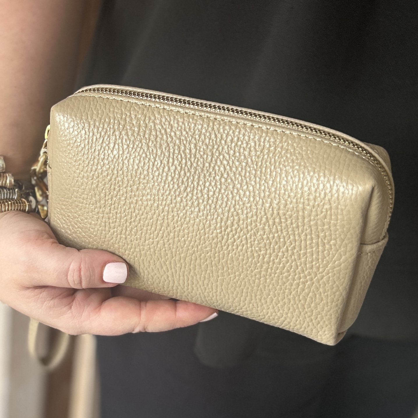 Light Taupe makeup bag in hand