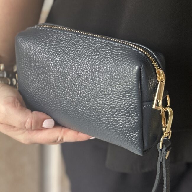 Navy bellezza pochette bag in hand