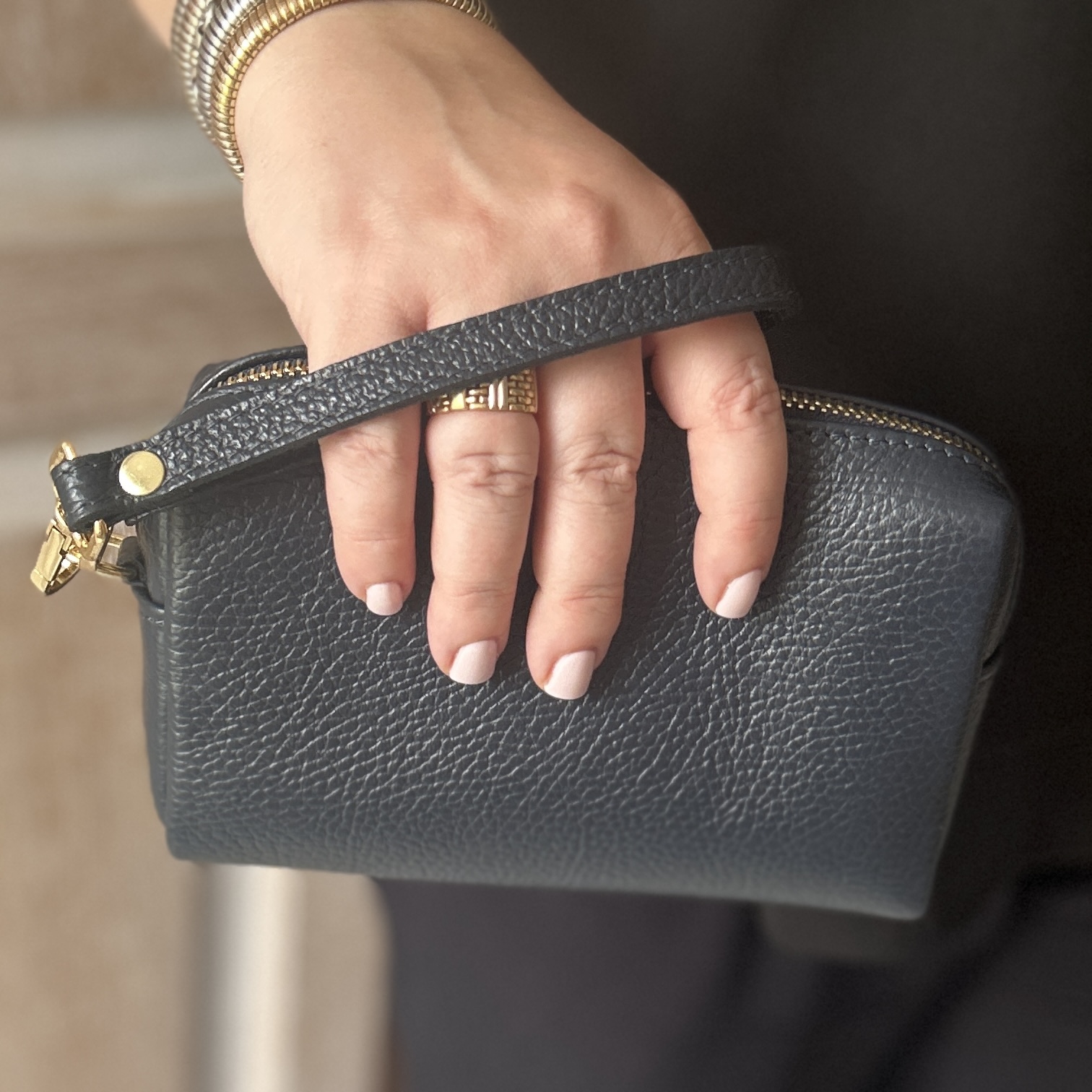 Navy bellezza pochette bag in hand
