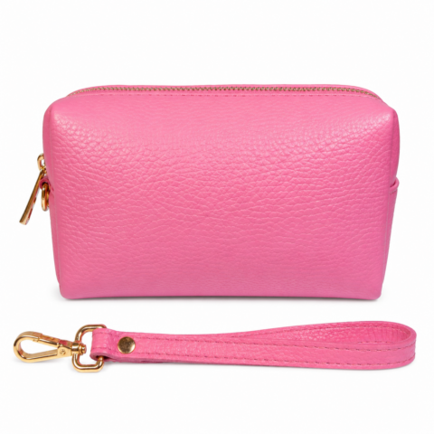 A small, pink pebbled leather bag with a detachable strap and gold clasp is shown on a white background, conveying elegance and simplicity.