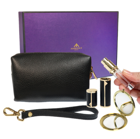 Luxurious gift set with a black pebbled leather pouch with detachable wrist strap, travel perfume atomiser, compact mirror and purple gift box. Elegant and sophisticated.