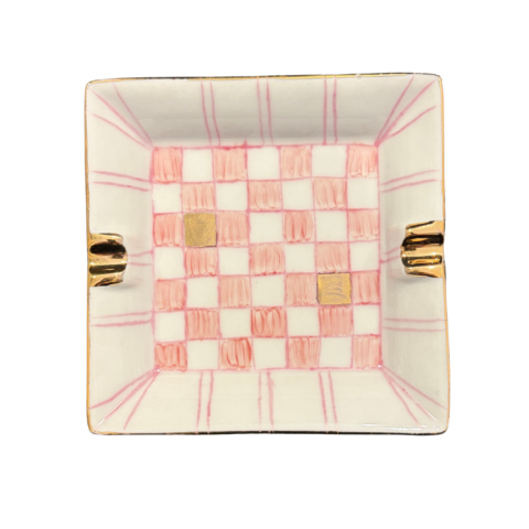 Square ceramic vide poche tidy tray with a pink and white checkered pattern and gold accents. The elegant design conveys a vintage and luxurious feel.