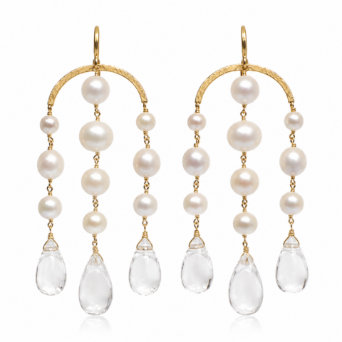 Elegant gold earrings feature cascading rows of white pearls and teardrop-shaped clear crystals, creating a luxurious, refined appearance.
