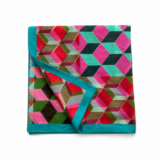 Colourful geometric sarong scarf with a folded corner, displaying a pattern of interlocking 3D cubes in pink, green, and red tones, bordered by teal.