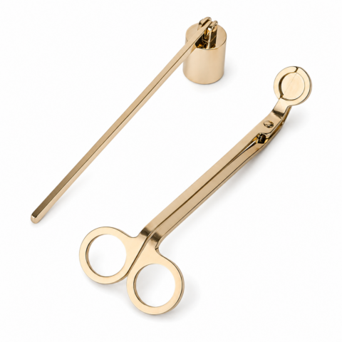 Gold candle snuffer and wick trimmer set on a white background. The elegant tools have a shiny metallic finish, conveying a sense of luxury.