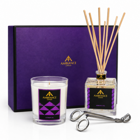 Luxury "Ancienne Ambiance London" scented candle, reed diffuser, and wick trimmer in silver are set against a purple box. The ambience is elegant and sophisticated.