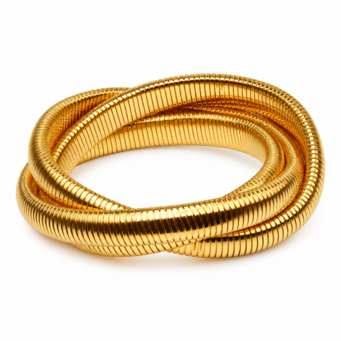 A shiny, coiled gold bracelet with a ribbed texture, creating a smooth and elegant looped design on a white background.