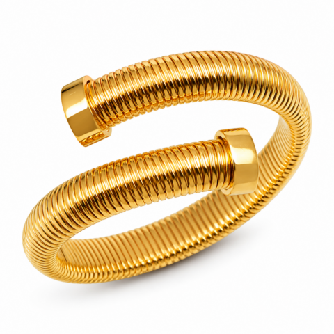 A shining, coiled gold bracelet with a textured, ribbed design. The open-ended bracelet exudes elegance and luxury against a plain white background.