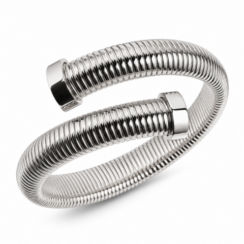 A coiled, metallic bracelet with a shiny, ribbed texture is depicted against a white background. The open-ended design conveys modern elegance.