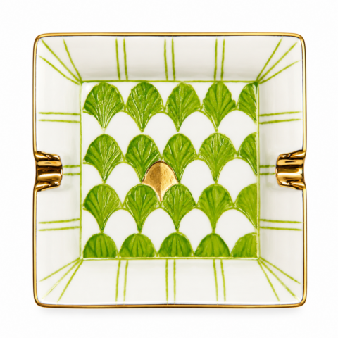 Elegant square porcelain tidy tray with a green and gold leaf pattern, featuring a shiny gold accent. Green lines border the rim. Luxurious and artistic design.