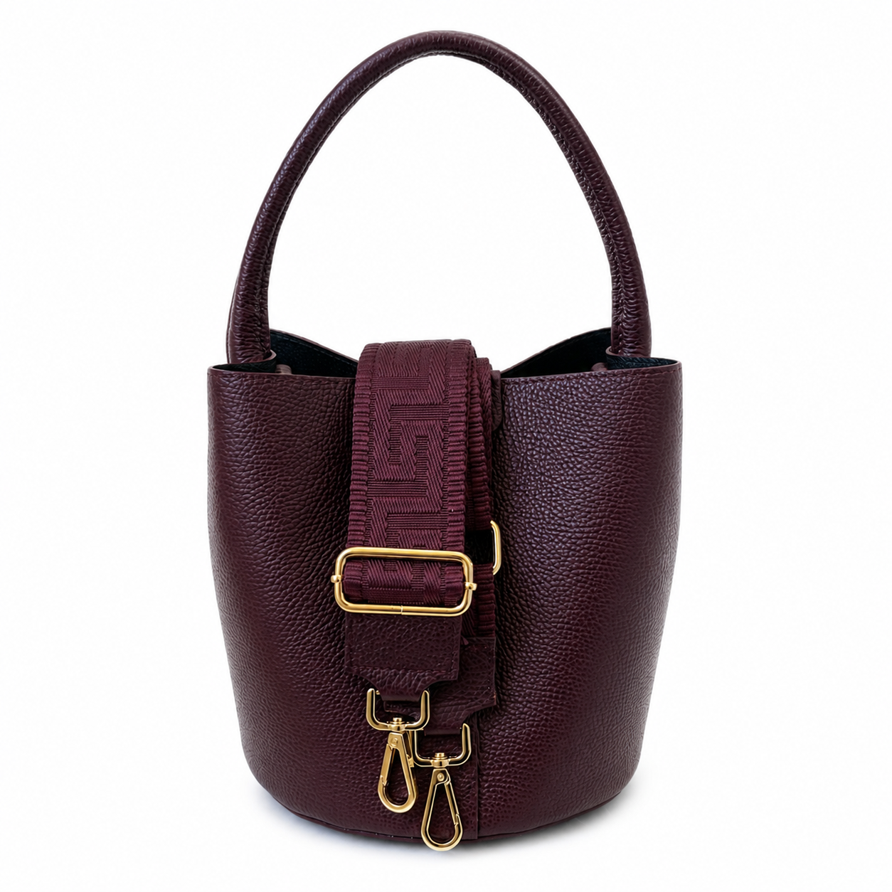 Dalu bucket bag in Pompeian Plum leather with detachable woven shoulder strap and gold hardware.