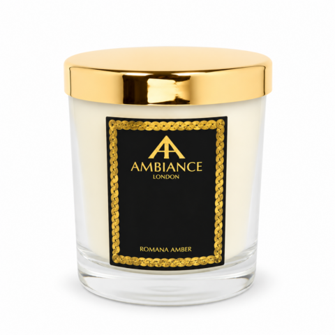 Romana Amber luxury scented candle by Ancienne Ambiance London in a clear glass vessel with a polished gold lid, shown on a white background.